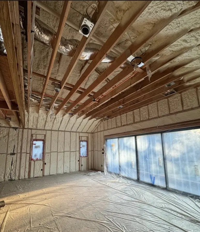 Interior walls and ceiling insulated with spray foam during new construction in Social Circle
